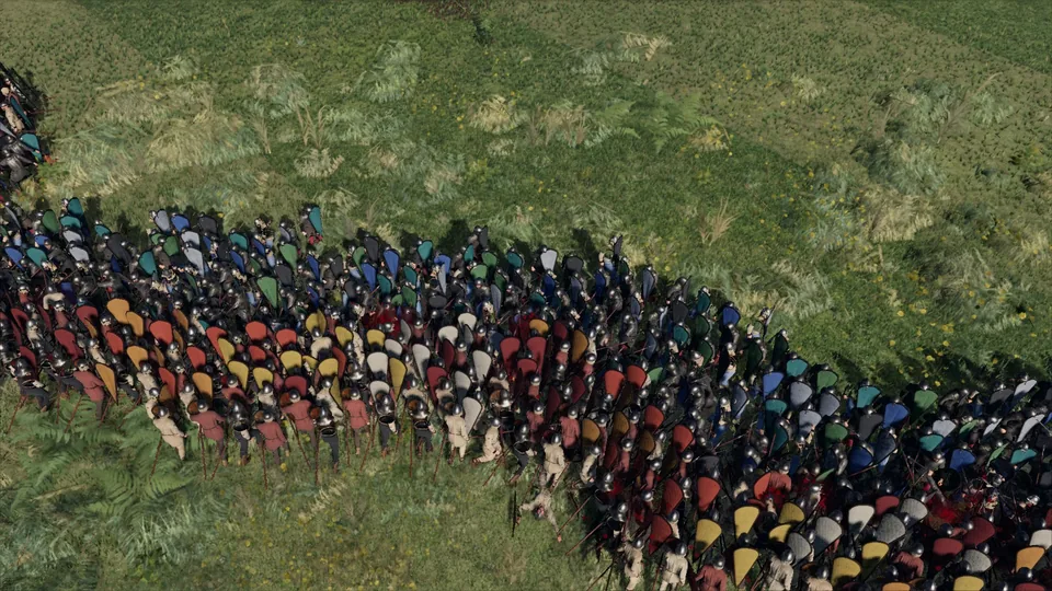 Two shield walls locked together across a meadow, seen from above